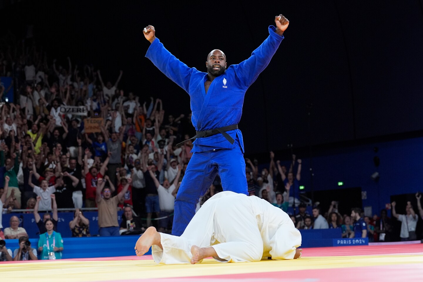 Riner celebrating